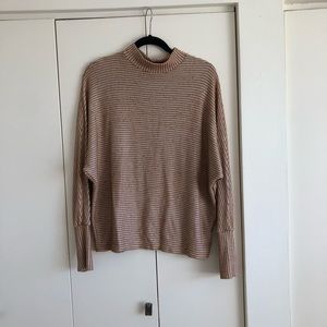 Out from under turtle neck sweater